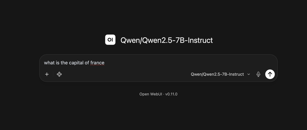 Screenshot of the Open WebUI chat input box displaying the selected model “Qwen/Qwen2.5-7B-Instruct” and the user prompt “what is the capital of France?”