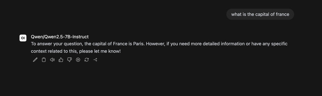 Screenshot of the Open WebUI chat interface displaying the model's generated response: “To answer your question, the capital of France is Paris.”